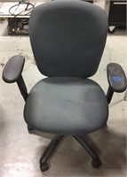Grey rolling office chair