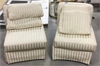 2 white cloth chairs