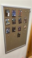 Pegboard with Assorted Sports Cards