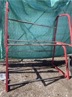 Pair of wall mounted tire racks. Approx. 52” x