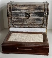 Decorative weathered wood hinged chest.
