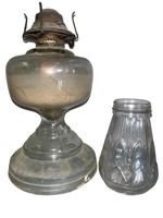 Antique clear glass oil lamp. No shade.