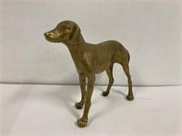 Brass dog. 7” tall. 11”  long