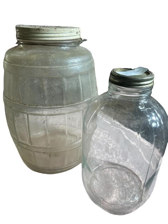 Large clear glass barrel shaped jar with
