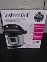 INSTA POT PROGRAMMABLE PRESSURE COOKER