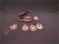 Six metal horse-related items: ashtray with full