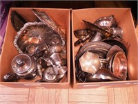 Two boxes of silverplate holloware: teapots,