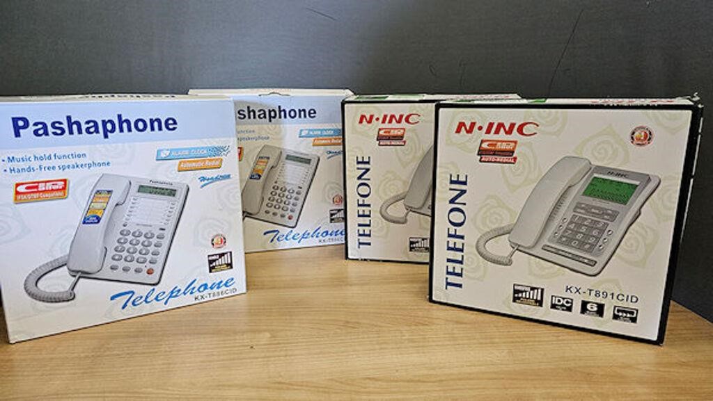 4 NEW TELEPHONES IN BOXES