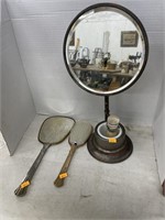 Antique shaving mirror and vintage brush and