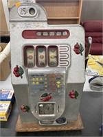 Antique coin operated slot machine