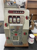 Antique coin operated slot machine