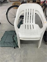 2 outdoor chairs and cushions