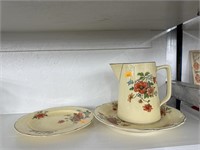 Vintage pitcher and plates