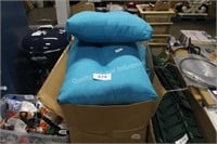 large box of patio cushions