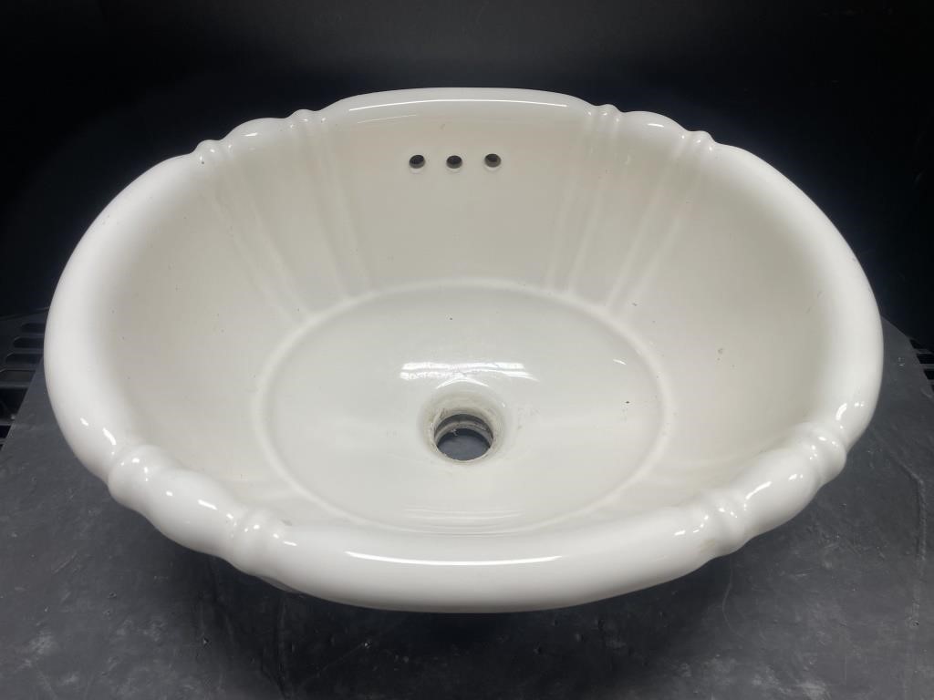 Ceramic bathroom sink. 17.5” x 14” x 9” deep.