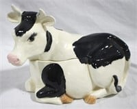 Cow laying down cookie jar, 12 x 9