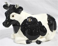 Cow laying down cookie jar, 12 x 9.5