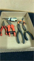 Small screwdrivers, needle nose pliers,  side