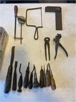 Primitive tools, including saw, picks, pliers and