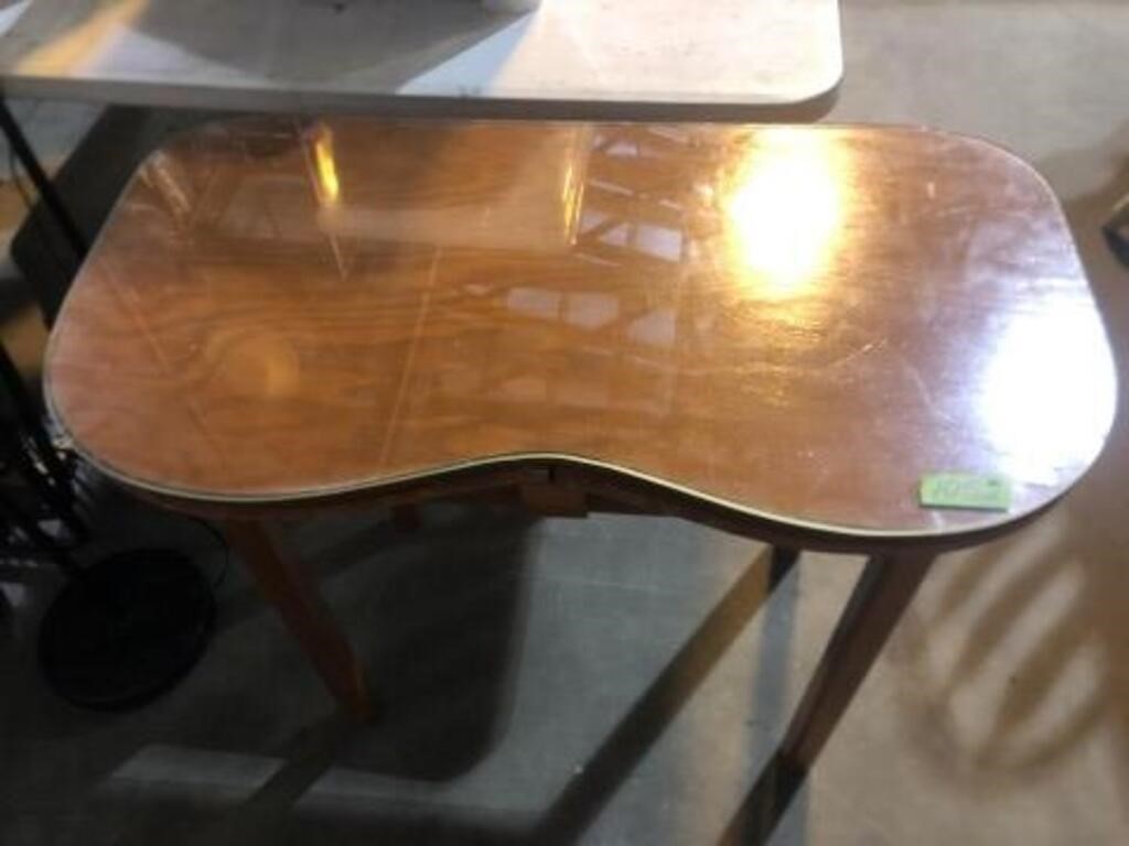 Wooden table with glass table top