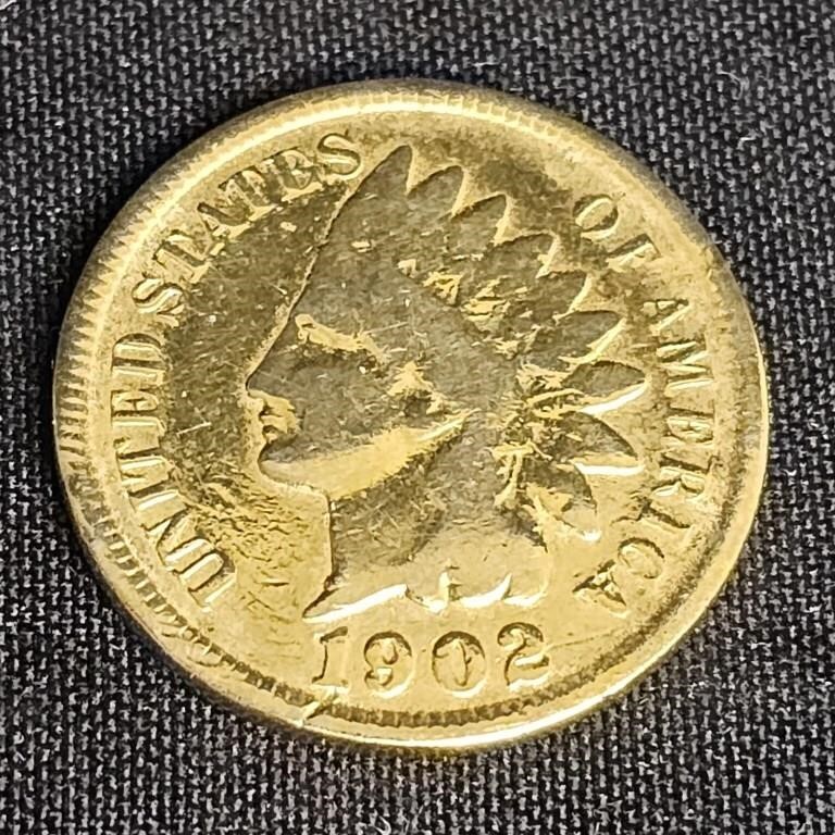 1902 Gold colored Indian Head Penny found inside