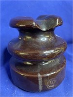 Brown porcelain  insulator.  See photo of chip.