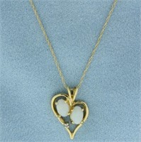 Opal and Diamond Heart Necklace in 14k Yellow Gold