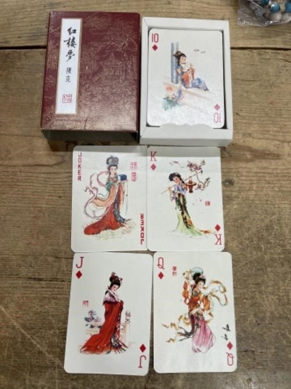 Asian ladies playing cards