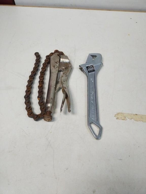 Pair of chain vise grips and thumb wrench