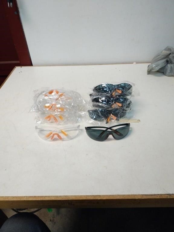 12.  pairs of safety glasses 6- clear and 6
