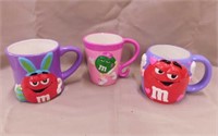 3 ceramic M&M's mugs