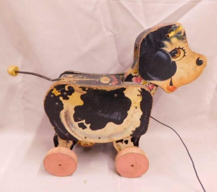 1955 Fisher-Price Moo-oo Cow pull toy