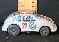 Tin wind-up VW beetle toy