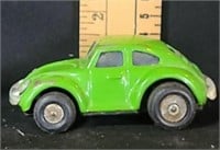 Vintage tin green VW beetle toy