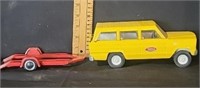 Vintage Tonka Jeep Wagoneer with red trailer