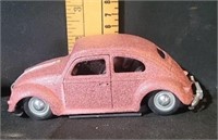 Pink sparkling VW beetle