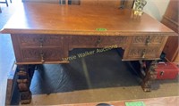 Ornate Carved Desk With Lion Leg Base 58x31x31".