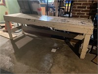 Primitive wooden table with metal top