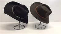(2) Western style hats. Brown one is a S/M and