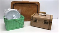 2 small vintage suitcases and a basket with
