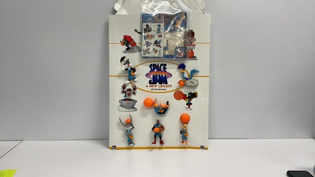 Space Jam poster with figurines twist ties in