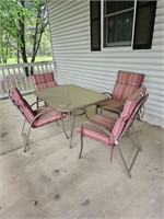 Outdoor glass table with 4 chairs