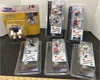 6 Hockey figurines.
