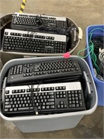 3 Bins of keyboards and wires