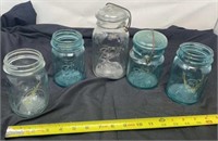 Blue and clear mason pint jars one w wire , quart