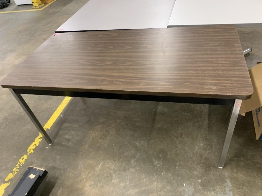 brown table with metal legs