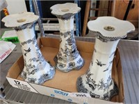BLACK AND WHITE ORIENTAL CERAMIC CANDLE STANDS