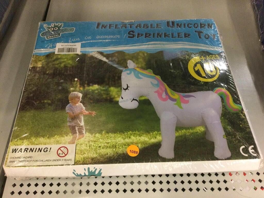 Nib inflatable unicorn sprinkler toy.