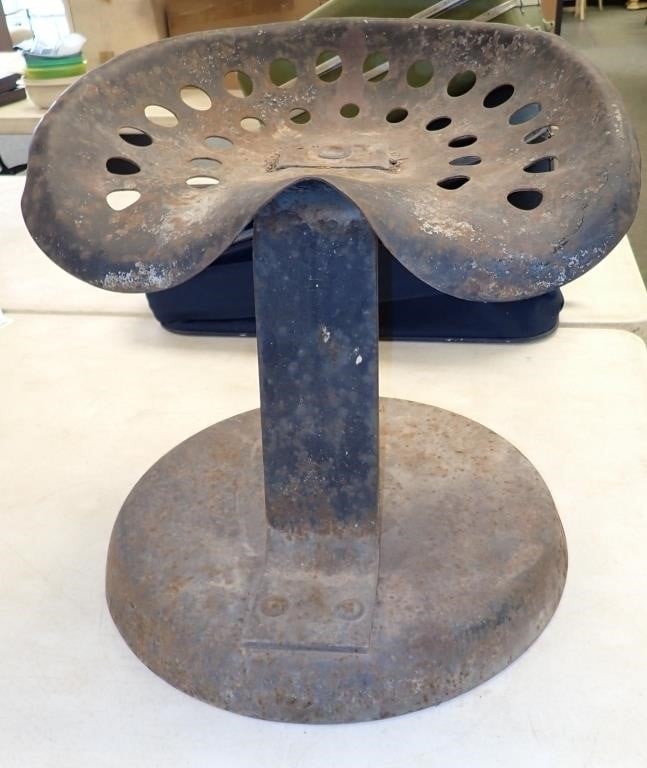 VINTAGE IMPLEMENT SEAT ON STAND