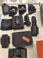 LARGE LOT OF GUN HOLSTERS / AMMO POUCHES ETC